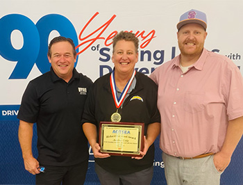 Audra Urie with AAA Team